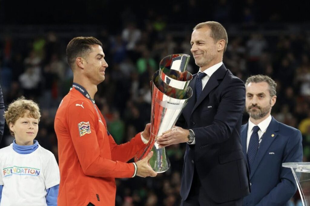 Alexander Ceferin presents Cristiano Ronaldo with the Nations League trophy - gettyimages.co.uk

